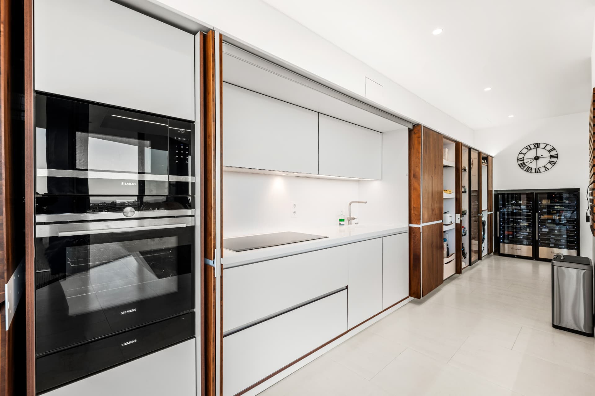 Walnut, light stone and hidden function.
