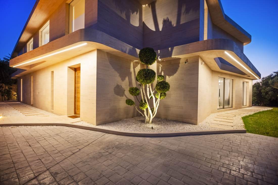 By night, the travertine is lit from within.
